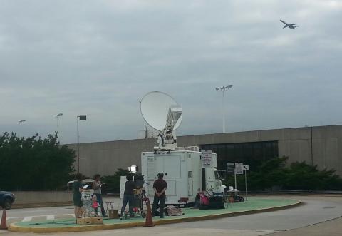 Satellite truck uplink at worlds busiest airport - 2014